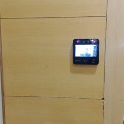 Employee using biometric attendance system