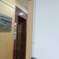 Employee using biometric attendance system